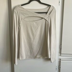 Minimal ribbed open chested cream color top. Tried on once! Like NEW!